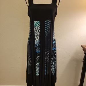 Candiss Cole. Packable microfiber dress. Figure flattering gored design.